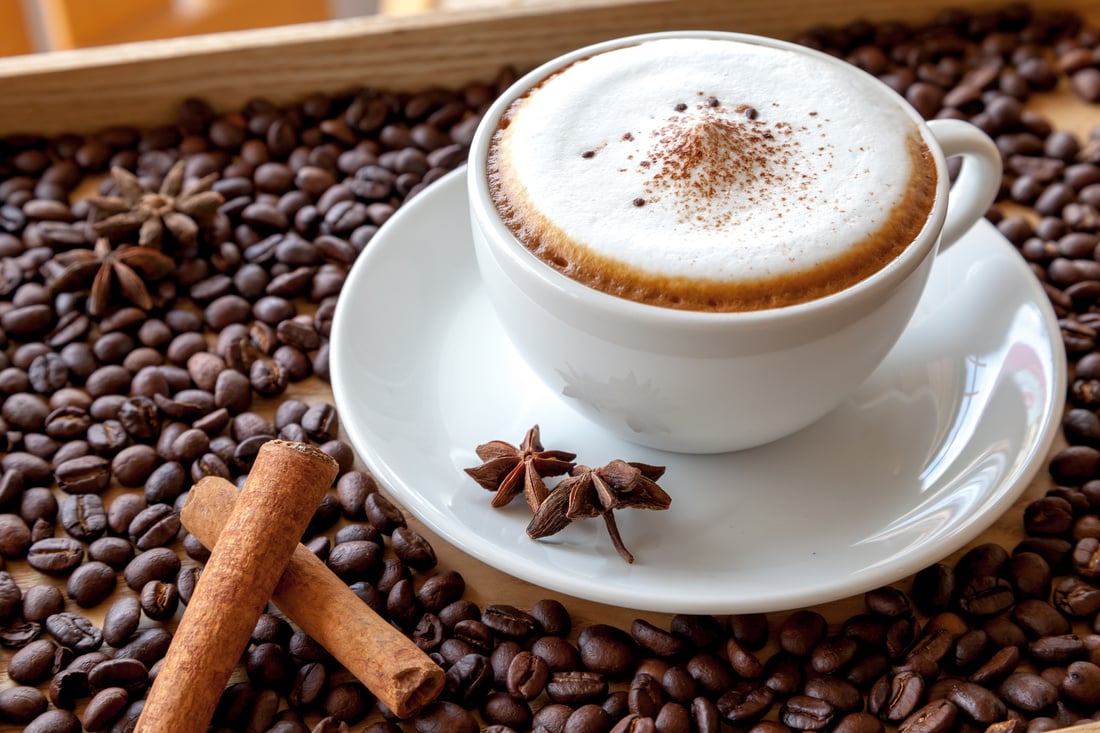 cappuccino with coffee beans