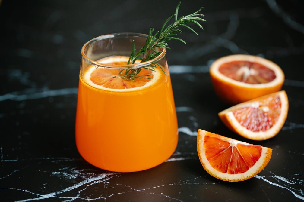 Orange Juice in Clear Drinking Glass