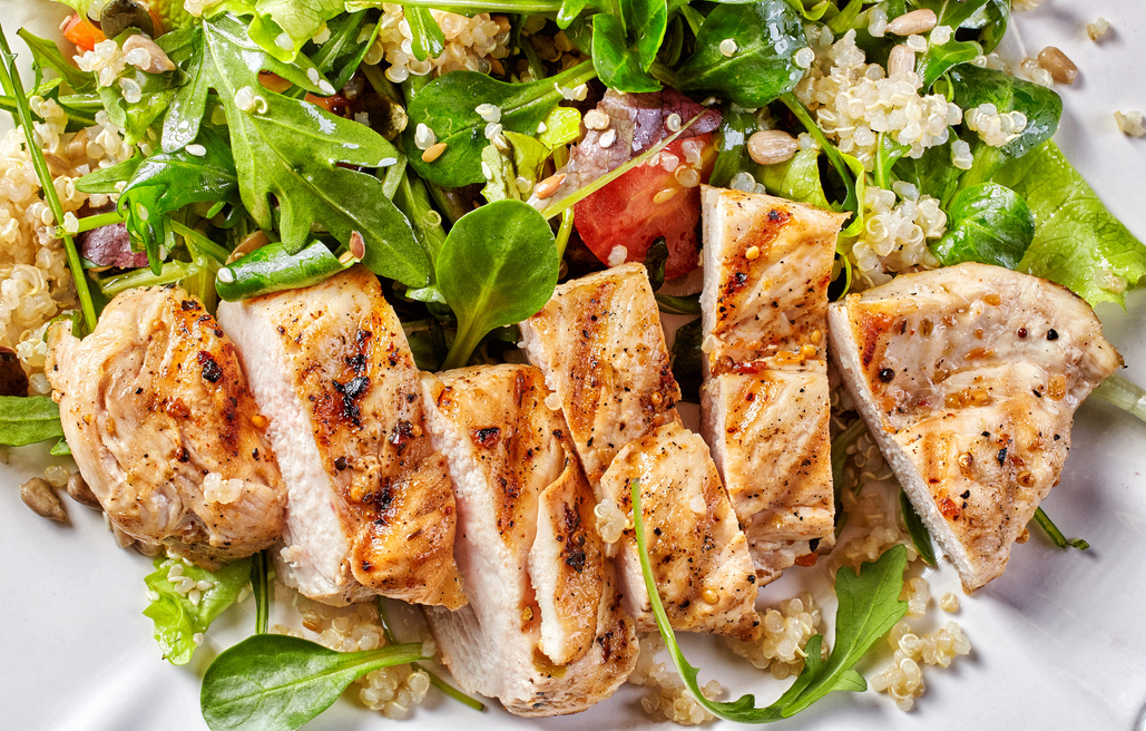 Quinoa and vegetable salad with grilled chicken